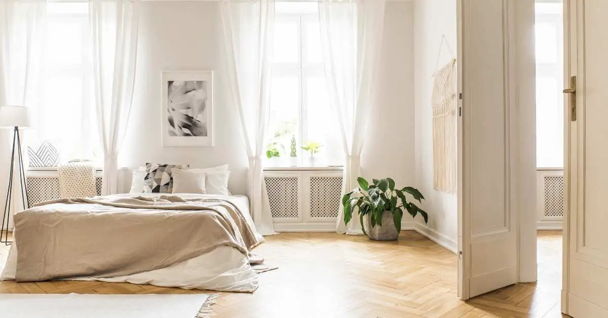 Can you hang curtains over hot water baseboard heaters?