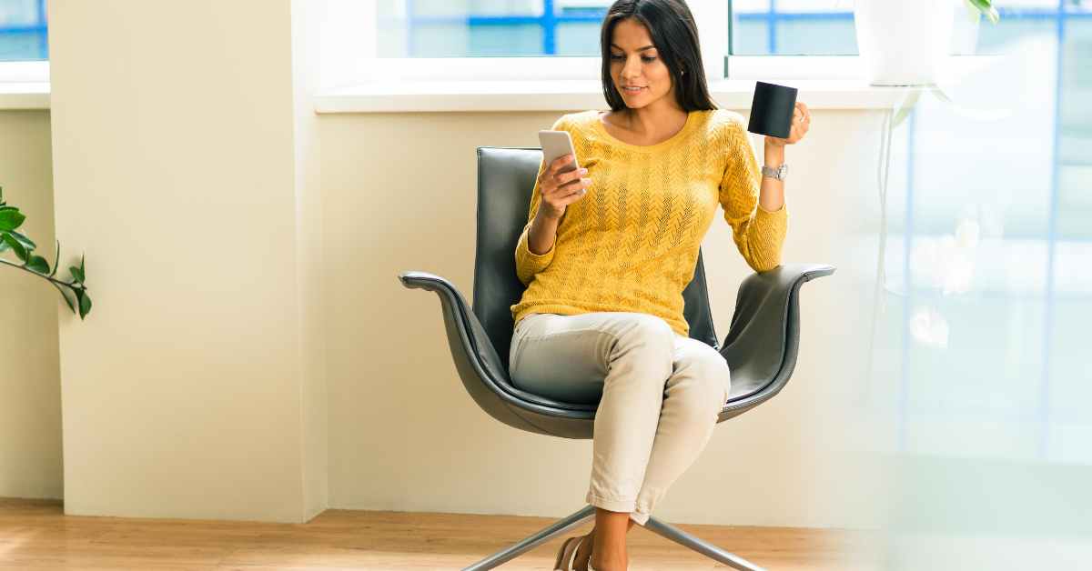 Should your feet touch the ground when sitting in a chair?